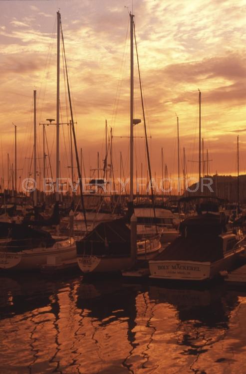 Sunset;colorful;sky;dana point;clouds;sun;yellow;water;boats;sillouettes;sailboats;anchorages;harbor;ocean